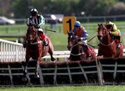 21 April 1997; Midnight Legend, with Richard Johnson up, jumps the last ahead of Toast The Spreece, with Charlie Swan up, and What's The Verdict, with Paul Cerberry up, on his way to winning the Country Pride Champion  Novice Hurdle on day on of the Punchestown Festival at Punchestown Racecourse in Kildare. Photo by David Maher/Sportsfile