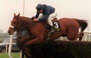 25 April 2000; Native Upmanship, with Conor O'Dwyer up, jumps the last on their way to winning the Powers Gold Cup at Fairyhouse Racecourse in Meath. Photo by Matt Browne/Sportsfile