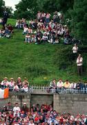 23 July 1995. Supporters watch on during the game. Ulster Senior Football Championship Final, Tyrone v Cavan, St. Tighearnach's Park, Clones, Co. Monaghan. Picture credit: Ray McManus / SPORTSFILE