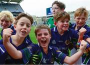 21 October 2015; St Pius X BNS Terenure's Michael Murphy, centre, leads the celebrations after their win in the Corn na NGearaltach over Bishop Galvin. Allianz Cumann na mBunscol Finals. Croke Park, Dublin. Picture credit: Piaras Ó Mídheach / SPORTSFILE