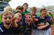 21 October 2015; St Pius X BNS Terenure's Michael Murphy, centre, leads the celebrations after their win in the Corn na NGearaltach over Bishop Galvin. Allianz Cumann na mBunscol Finals. Croke Park, Dublin. Picture credit: Piaras Ó Mídheach / SPORTSFILE