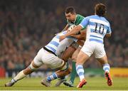 18 October 2015; Rob Kearney, Ireland, is tackled by Tomas Lavanini, left, and Nicolas Sanchez, Argentina. 2015 Rugby World Cup Quarter-Final, Ireland v Argentina. Millennium Stadium, Cardiff, Wales. Picture credit: Stephen McCarthy / SPORTSFILE