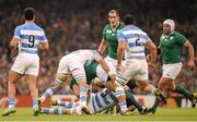18 October 2015; Tommy Bowe, Ireland, is tackled by Argentina's Tomas Lavanini and Leonardo Senatore resulting in him leaving the pitch with an injury. 2015 Rugby World Cup Quarter-Final, Ireland v Argentina. Millennium Stadium, Cardiff, Wales. Picture credit: Stephen McCarthy / SPORTSFILE