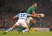 18 October 2015; Robbie Henshaw, Ireland, is tackled by Juan Martin Hernandez, Argentina. 2015 Rugby World Cup Quarter-Final, Ireland v Argentina. Millennium Stadium, Cardiff, Wales. Picture credit: Stephen McCarthy / SPORTSFILE