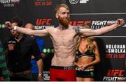 23 October 2015; Paddy Holohan weighs in for his flyweight bout against Louis Smolka. UFC Fight Night Weigh In. 3Arena, Dublin. Picture credit: Ramsey Cardy / SPORTSFILE