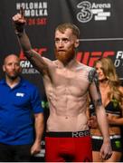 23 October 2015; Paddy Holohan weighs in for his flyweight bout against Louis Smolka. UFC Fight Night Weigh In. 3Arena, Dublin. Picture credit: Ramsey Cardy / SPORTSFILE