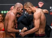 23 October 2015; Cathal Pendred, left, faces off against Tom Breese ahead of their welterweight bout. UFC Fight Night Weigh In. 3Arena, Dublin. Picture credit: Ramsey Cardy / SPORTSFILE