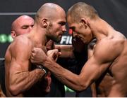 23 October 2015; Cathal Pendred, left, faces off against Tom Breese ahead of their welterweight bout. UFC Fight Night Weigh In. 3Arena, Dublin. Picture credit: Ramsey Cardy / SPORTSFILE