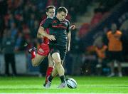 23 October 2015; Andrew Conway, Munster, kicks the ball towards the Scarlets' try line on his way to scoring his side's opening try. Guinness PRO12, Round 5, Scarlets v Munster. Parc Y Scarlets, Llanelli, Wales. Picture credit: Chris Fairweather / SPORTSFILE