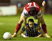 23 October 2015; James Chambers, St Patrick's Athletic, helps Sander Puri, Sligo Rovers, to his feet. SSE Airtricity League Premier Division, St Patrick's Athletic v Sligo Rovers. Richmond Park, Dublin. Picture credit: David Maher / SPORTSFILE