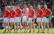 13 June 2009; The Cork defence, from left, Noel O'Leary, Anthony Lynch, Graham Canty, goalkeeper Alan Quirke, John Miskella, Michael Shields and Ray Carey stand for the narional anthem before the game. GAA Football Munster Senior Championship Semi-Final Replay, Cork v Kerry, Pairc Ui Chaoimh, Cork. Picture credit: Brendan Moran / SPORTSFILE