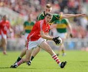 13 June 2009; Ray Carey, Cork, in action against Tommy Walsh, Kerry. GAA Football Munster Senior Championship Semi-Final Replay, Cork v Kerry, Pairc Ui Chaoimh, Cork. Picture credit: Brendan Moran / SPORTSFILE