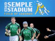 14 June 2009; Limerick players Damien Reale, 2 and Donal O'Grady run out onto the pitch before the start of the game. GAA Hurling Munster Senior Championship Semi-Final, Limerick v Waterford, Semple Stadium, Thurles, Co. Tipperary. Picture credit: Brendan Moran / SPORTSFILE
