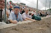 23 July 1995. Supporters watch on during the game. Ulster Senior Football Championship Final, Tyrone v Cavan, St. Tighearnach's Park, Clones, Co. Monaghan. Picture credit: Ray McManus / SPORTSFILE