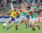 20 June 2009; Brian Higgins, Roscommon, in action against Trevor Howley, Mayo. GAA Football Connacht Senior Championship Semi-Final, Mayo v Roscommon, McHale Park, Castlebar, Co. Mayo. Picture credit: Ray Ryan / SPORTSFILE