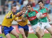 20 June 2009; Keith Higgins, Mayo, in action against John Dunning and Cathal McHugh, Roscommon. GAA Football Connacht Senior Championship Semi-Final, Mayo v Roscommon, McHale Park, Castlebar, Co. Mayo. Picture credit: Ray Ryan / SPORTSFILE