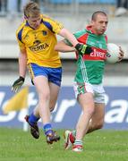 20 June 2009; Trevor Mortimer, Mayo, in action against Peter Domican, Roscommon. GAA Football Connacht Senior Championship Semi-Final, Mayo v Roscommon, McHale Park, Castlebar, Co. Mayo. Picture credit: Ray Ryan / SPORTSFILE