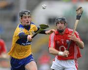 21 June 2009; Nicky O'Connell, Clare, in action against Stephen Moylan, Cork. Munster Intermediate Hurling Championship Semi-Final, Cork v Clare, Gaelic Grounds, Limerick. Picture credit: Brendan Moran / SPORTSFILE