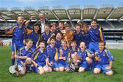 18 June 2009; Our Ladys BNS team celebrate with the Corn Harry Conlon after the match. Allianz Cumann na mBunscoil Finals, Our Ladys BNS, Ballinteer, v Scoil Colm, Crumlin, Corn Harry Conlon, Croke Park, Dublin. Picture credit: Brian Lawless / SPORTSFILE
