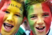 18 June 2009; Oatlands pupils, Liam McGrath, age 11, left, and Andrew Kinsella, age 12, show their support during the match. Allianz Cumann na mBunscoil Finals, Oatlands, Mt. Merrion, v St. Patrick's, Drumcondra, Corn Fianna Fail, Croke Park, Dublin. Picture credit: Brian Lawless / SPORTSFILE