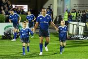 23 October 2015; Leinster captain Isa Nacewa with matchday mascots Jamie Thompson, age 6, from Sandyford, and Lea Carrigy, age 8, from Foxrock, at the Guinness PRO12, Round 5, clash between Leinster and Glasgow Warriors at the RDS, Ballsbridge, Dublin. Picture credit: Stephen McCarthy / SPORTSFILE