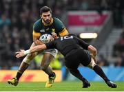 24 October 2015; Damian de Allende, South Africa, is tackled by Dan Carter, New Zealand. 2015 Rugby World Cup, Semi-Final, New Zealand v South Africa. Twickenham Stadium, Twickenham, London, England. Picture credit: Ramsey Cardy / SPORTSFILE