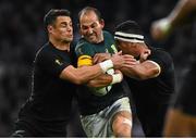24 October 2015; Fourie du Preez, South Africa, is tackled by Dan Carter, left, and Jerome Kaino, New Zealand. 2015 Rugby World Cup, Semi-Final, New Zealand v South Africa. Twickenham Stadium, Twickenham, London, England. Picture credit: Ramsey Cardy / SPORTSFILE