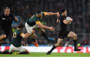 24 October 2015; Nehe Milner-Skudder, New Zealand, is tackled by Handré Pollard, left, and Francois Louw, South Africa. 2015 Rugby World Cup, Semi-Final, New Zealand v South Africa. Twickenham Stadium, Twickenham, London, England. Picture credit: Ramsey Cardy / SPORTSFILE