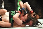 24 October 2015; Aisling Daly, left, in action against Ericka Almeida. UFC Fight Night. 3Arena, Dublin. Picture credit: Stephen McCarthy / SPORTSFILE