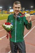 24 October 2015; Ireland's Michael McKillop, from Newtownabbey, Co. Antrim, celebrates with his gold medal after winning the Men's 800m T38  Final in a time of 2:01.31. IPC Athletics World Championships. Doha, Qatar. Picture credit: Marcus Hartmann / SPORTSFILE