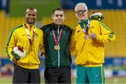 24 October 2015; Ireland's Jason Smyth, centre, from Eglinton, Co. Derry, celebrates on the podium after winning the Men's 100m T13 Final in a time of 10.62 with bronze medallist Chad Perris, right, Sweden, and silver medallist Gustavo Araujo, Brazil. IPC Athletics World Championships. Doha, Qatar. Picture credit: Marcus Hartmann / SPORTSFILE