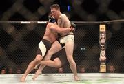 24 October 2015; Darren Till, right, in action against Nicolas Dalby. UFC Fight Night. 3Arena, Dublin. Picture credit: Stephen McCarthy / SPORTSFILE
