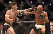 24 October 2015; Norman Parke, left, in action against Reza Madadi. UFC Fight Night. 3Arena, Dublin. Picture credit: Stephen McCarthy / SPORTSFILE