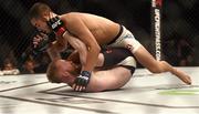 24 October 2015; Louis Smolka, top, in action against Paddy Holohan. UFC Fight Night, Patrick Holohan v Louis Smolka. 3Arena, Dublin. Picture credit: Stephen McCarthy / SPORTSFILE