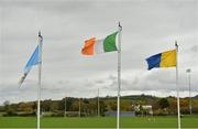 25 October 2015; The flags of Na Piarsaigh, left, and Sixmilebridge fly alongside the tricolour ahead of the game. AIB Munster GAA Senior Club Hurling Championship, Sixmilebridge v Na Piarsaigh. O'Garney Park, Sixmilebridge, Co. Clare. Picture credit: Piaras Ó Mídheach / SPORTSFILE