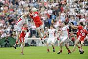 21 June 2009; Joe Diver, Derry, in action against Kevin Hughes, Tyrone. GAA Football Ulster Senior Championship Semi-Final, Tyrone v Derry, Casement Park, Belfast, Co. Antrim. Picture credit: Oliver McVeigh / SPORTSFILE