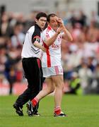 21 June 2009; Brian Dooher, Tyrone, gestures to Barry McGuigan, Derry, as he is taken off as a blood substitute, having previously been involved in an incident with him. GAA Football Ulster Senior Championship Semi-Final, Tyrone v Derry, Casement Park, Belfast, Co. Antrim. Photo by Sportsfile