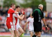 21 June 2009; Joe Diver, Derry, in a tussle with Enda McGinley, Tyrone. GAA Football Ulster Senior Championship Semi-Final, Tyrone v Derry, Casement Park, Belfast, Co. Antrim. Photo by Sportsfile