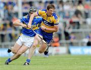 21 June 2009; Diarmuid McMahon, Clare, in action against Paul Curran, Tipperary. GAA Hurling Munster Senior Championship Semi-Final, Tipperary v Clare, Gaelic Grounds, Limerick. Picture credit: Ray McManus / SPORTSFILE