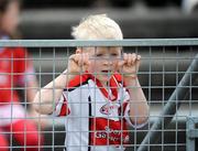 21 June 2009; Derry supporter Patrick Harley-Moyes, aged five, from Portstewart, Co. Derry, watches on during the game. GAA Football Ulster Senior Championship Semi-Final, Tyrone v Derry, Casement Park, Belfast, Co. Antrim. Picture credit: Daire Brennan / SPORTSFILE