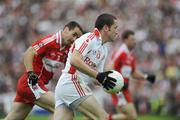 21 June 2009; Stephen O'Neill, Tyrone, in action against Sean Martin Lockhart, Derry. GAA Football Ulster Senior Championship Semi-Final, Tyrone v Derry, Casement Park, Belfast, Co. Antrim. Picture credit: Oliver McVeigh / SPORTSFILE