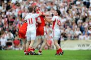 21 June 2009; A row breaks out among the players during the 2nd half. GAA Football Ulster Senior Championship Semi-Final, Tyrone v Derry, Casement Park, Belfast, Co. Antrim. Picture credit: Daire Brennan / SPORTSFILE