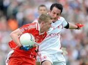 1625 - 21 June 2009; Eoghan Brown, Derry, in action against Davy Harte, Tyrone. GAA Football Ulster Senior Championship Semi-Final, Tyrone v Derry, Casement Park, Belfast, Co. Antrim. Picture credit: Daire Brennan / SPORTSFILE