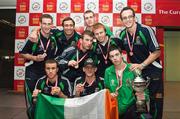 21 June 2009; Ireland's team, back row (L-R) Willie MCLaughlin (Silver), Kenny Egan (Bronze), John Joe Nevin (Silver), Con Sheehan (Gold), Phil Sutcliffe (Bronze), Darren O'Neill (Gold) front row (L-R) Davy Oliver Joyce, Eric Donovan (Bronze) and Declan Geraghty (Silver) display the medals they won at the European Union Championships in Odense, Denmark, during their arrival home at Dublin Airport, Dublin. Picture credit: John Barrington / SPORTSFILE