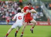 21 June 2009; Barry McGoldrick, Derry, in action against Conor Gormley, Tyrone. GAA Football Ulster Senior Championship Semi-Final, Tyrone v Derry, Casement Park, Belfast, Co. Antrim. Picture credit: Oliver McVeigh / SPORTSFILE