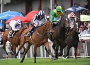 27 June 2009; Eventual winner Walk On Bye, with Wayne Lordan up, races alongside Mister Tee, with Emmet McNamara up, right, during the closing stages of the Barronstown Stud European Breeders Fund Maiden. Curragh Racecourse, Co. Kildare. Picture credit: Pat Murphy / SPORTSFILE