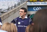 22 June 2009; Ulster Bank GAA stars Kevin McGuckin, Derry and Sean Og O hAilpin, Cork, welcomed pupils from schools to Croke Park as part of the Ulster Bank/Irish News competition where 5 lucky classes won a school trip of a lifetime which included a tour of the famous Croke Park stadium while also meeting some of the biggest GAA stars in the country. Pictured are Kevin listening to questions from pupils from St Joseph's Primary School, Co. Down. Croke Park, Dublin. Picture credit: Brendan Moran / SPORTSFILE  *** Local Caption ***