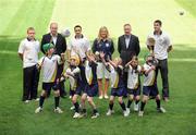 23 June 2009; At the launch of the Vhi GAA Cúl Camp Ambassador Programme were National Ambassadors, from left, Kilkenny senior hurler Richie Hogan, Dublin hurling manager Anthony Daly, National and World Handball Champion Paul Brady, from Cavan, Cork ladies senior footballer Angela Walsh, Declan Moran, Director of Marketring Vhi, and Dublin senior footballer Ross McConnell with children, from left, 11 year old Liam Smyth, from O'Toole's GAA Club, Dublin, 9 year old Liam Wolfe, from Kilmacud Crokes GAA Club, Dublin, 11 year old Cian Byrne, from Ballyboden St. Enda's GAA Club, Dublin, 9 year old Jean Brennan, from Barna GAA Club, Galway, 8 year old Milana McGuirk, from Dunboyne GAA Club, Co. Meath, and 8 year old Sean Kinsella, from Kilmacud Crokes GAA Club, Dublin. Fifty GAA senior county players will be visiting 927 camps this summer. Book your child’s place at www.vhiculcamps.gaa.ie. Croke Park, Dublin. Photo by Sportsfile  *** Local Caption ***