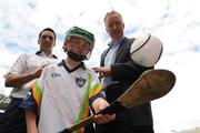 23 June 2009; 8 year old Sean Kinsella, from Kilmacud Crokes GAA Club, Dublin, with National and World Handball champion Paul Brady, from Cavan, and Declan Moran, right, Director of Marketing Vhi, at the launch of the Vhi GAA Cúl Camp Ambassador Programme. Fifty GAA senior county players will be visiting 927 camps this summer. Book your child’s place at www.vhiculcamps.gaa.ie. Croke Park, Dublin. Photo by Sportsfile  *** Local Caption ***
