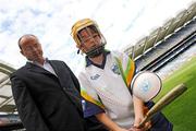 23 June 2009; 11 year old Liam Wolfe, from Ballyboden St. Endas GAA Club, Dublin, shows off his hurling skills to Dublin hurling manager Anthony Daly at the launch of the Vhi GAA Cúl Camp Ambassador Programme. Fifty GAA senior county players will be visiting 927 camps this summer. Book your child’s place at www.vhiculcamps.gaa.ie. Croke Park, Dublin. Photo by Sportsfile          *** Local Caption ***